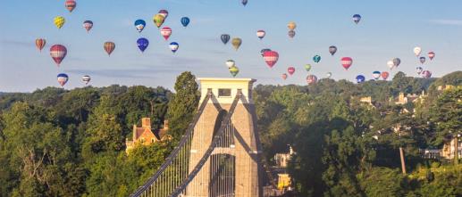 900 x 385 suspension-bridge-and-balloons